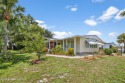 Beautiful updated manufactured home in Barefoot Bay. New roof in for sale in Barefoot Bay Florida Brevard County County on GolfHomes.com