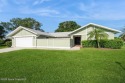 Step into this completely remodeled Washington model, nestled in for sale in Melbourne Florida Brevard County County on GolfHomes.com