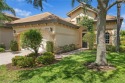 Discover refined Florida living in this beautifully crafted for sale in Estero Florida Lee County County on GolfHomes.com