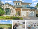 Captivating golf course views abound from this custom-built for sale in Reunion Florida Osceola County County on GolfHomes.com