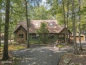 Nestled in the desirable Tanglwood Lakes community, this for sale in Greentown Pennsylvania Pike County County on GolfHomes.com