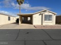 55 plus gated community, you own the land.  2 bedroom 1 bath for sale in Mesa Arizona Maricopa County County on GolfHomes.com