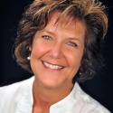 Roxane Schiller with RE/MAX Property Shop in WI advertising on GolfHomes.com