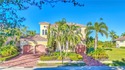 Welcome to this stunning Tuscan-inspired estate featuring an for sale in Port Saint Lucie Florida Saint Lucie County County on GolfHomes.com