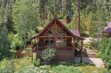 This log-sided home in Garden Valley has been lovingly for sale in Garden Valley Idaho Boise County County on GolfHomes.com