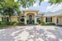 Welcome to 645 Whisper Woods Drive, a stunning estate located in for sale in Lakeland Florida Polk County County on GolfHomes.com