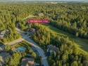 Nestled amongst tall pines overlooking the 6th green of the Golf for sale in Columbia Falls Montana Flathead County County on GolfHomes.com