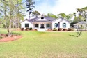 1.48 acres occupies this farmhouse style home with a for sale in Valdosta Georgia Lowndes County County on GolfHomes.com
