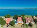 Welcome to your dream lakefront retreat! This stunning 5-bedroom for sale in Rockwall Texas Rockwall County County on GolfHomes.com