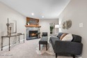 Unlimited golf for TWO owners! Privacy and serenity tucked in for sale in Rathdrum Idaho Kootenai County County on GolfHomes.com