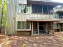 Recently UPDATED 2 bedroom ground floor unit! Quiet wooded for sale in Glen Arbor Michigan Leelanau County County on GolfHomes.com