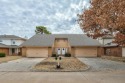 This rare duplex opportunity offers two spacious units--each for sale in Yukon Oklahoma Canadian County County on GolfHomes.com