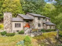 Set on 1.46 acres in Tanglwood Lakes, this 3,310-SF PRIVATE for sale in Greentown Pennsylvania Pike County County on GolfHomes.com