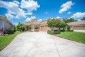 THIS POPULAR DORCHESTER plan home in the Laurel Glen community for sale in Lakeland Florida Polk County County on GolfHomes.com