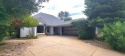 Entertaining or enjoying quiet moments, this expansive home for sale in Redding California Shasta County County on GolfHomes.com