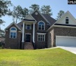 This stunning property boasts six bedrooms and five and a half for sale in Chapin South Carolina Lexington County County on GolfHomes.com