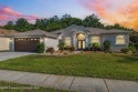 Tucked within the gated golfing community of Hernando Oaks, this for sale in Brooksville Florida Hernando County County on GolfHomes.com