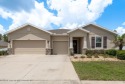 Welcome to this beautifully maintained 4-bedroom, 3.5-bathroom for sale in Spring Hill Florida Hernando County County on GolfHomes.com