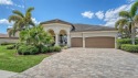 Located in Lakewood National Golf Club on an oversized homesite for sale in Lakewood Ranch Florida Manatee County County on GolfHomes.com