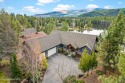 Perched on the peaceful shores of Sans Souci Lake, this for sale in Blanchard Idaho Bonner County County on GolfHomes.com