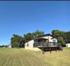 Well-maintained 2-bedroom, 2-bath home situated on a 50' x 150' for sale in Quitman Texas Wood County County on GolfHomes.com