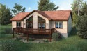 Construction initiated upon customer purchase agreement. Covered for sale in Arkdale Wisconsin Adams County County on GolfHomes.com