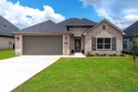 Welcome to this beautifully designed 3-bedroom, 2-bath home for sale in Longview Texas Gregg County County on GolfHomes.com