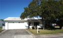 Located in the highly desirable Mainlands community, this for sale in Pinellas Park Florida Pinellas County County on GolfHomes.com