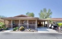 #97 Welcome to this beautifully maintained 3-bedroom, 2-bathroom for sale in Gold Canyon Arizona Pinal County County on GolfHomes.com