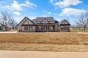 WELCOME to this ELEGANT NEW HOME Located in PECAN PLANTATION for sale in Granbury Texas Hood County County on GolfHomes.com