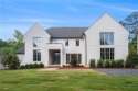 Set on a sprawling 1-acre lot in an established, tree-lined for sale in Atlanta Georgia Fulton County County on GolfHomes.com