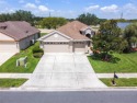 Beautiful one story home in Plantation Palms! This home features for sale in Land O Lakes Florida Pasco County County on GolfHomes.com