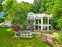 Welcome to your dream lakefront retreat! This stunning 6-bedroom for sale in Malvern Ohio Carroll County County on GolfHomes.com