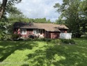 Lakefront living at Lake Winola with 120 feet of lake frontage! for sale in Factoryville Pennsylvania Wyoming County County on GolfHomes.com