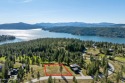 This lot located at Gozzer Ranch Golf and Lake Club. Spacious for sale in Harrison Idaho Kootenai County County on GolfHomes.com