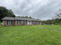 4 bedroom/3 bath brick home sitting on 7.28 acres. This 1 story for sale in Park City Kentucky Barren County County on GolfHomes.com