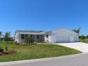 This never owned new Palm Harbor Black Diamond model is ready for sale in Port Orange Florida Volusia County County on GolfHomes.com