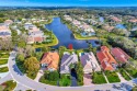 This beautiful residence offers a clean contemporary design that for sale in Palm Beach Gardens Florida Palm Beach County County on GolfHomes.com