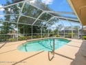 Spacious 3/2/2 well-maintained pool home with split floor plan for sale in Spring Hill Florida Hernando County County on GolfHomes.com