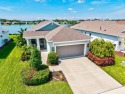 Lakeside luxury on the largest lake in Canoe Creek defines this for sale in Parrish Florida Manatee County County on GolfHomes.com