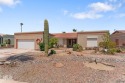 Welcome to Mesa Del Sol! Discover this move in ready 3-bedroom for sale in Yuma Arizona Yuma County County on GolfHomes.com