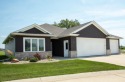 Fall in love with this stand alone, like new condo in Prairie for sale in Waverly Iowa Bremer County County on GolfHomes.com