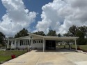 Spacious and well-appointed, this move-in ready two-bedroom for sale in Brooksville Florida Hernando County County on GolfHomes.com