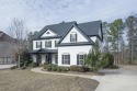 Welcome to your dream home in the prestigious Heron Bay for sale in Locust Grove Georgia Henry County County on GolfHomes.com