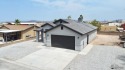 Brand-new, custom touches--golf-course lifestyle under $300K! for sale in Wellton Arizona Yuma County County on GolfHomes.com