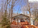 Escape to the ultimate mountain retreat in this stunning 4 for sale in Beech Mountain North Carolina Watauga County County on GolfHomes.com