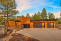 This modern 5-bed, 4.5-bath sits on a premier lot overlooking for sale in Flagstaff Arizona Coconino County County on GolfHomes.com