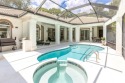 Step into luxury at this Burnt Pine Golf Course gem for sale in Miramar Beach Florida Walton County County on GolfHomes.com