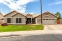 Welcome to this stunning home situated on a spacious corner lot for sale in Glendale Arizona Maricopa County County on GolfHomes.com