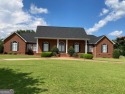 Beautiful Brick Home with circle Driveway. Step Inside to a for sale in Dublin Georgia Laurens County County on GolfHomes.com